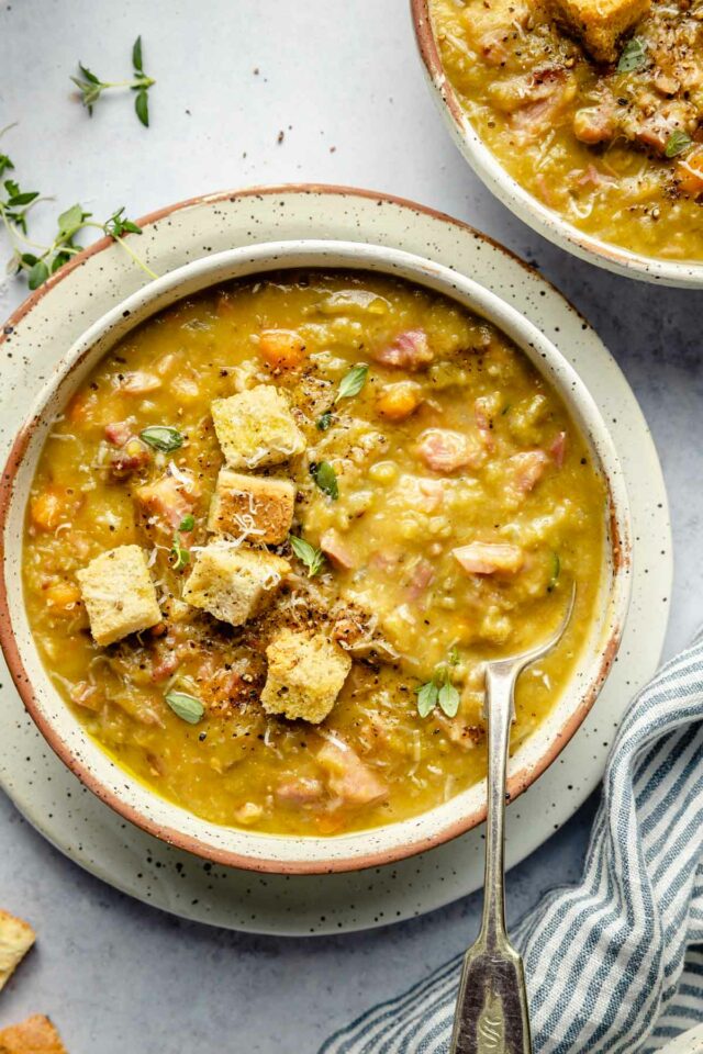 Split pea soup topped with croutons and fresh thyme.