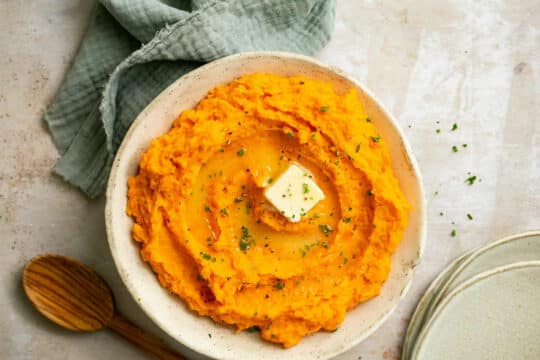Serving sweet potatoes with butter.