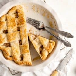 Slices of pear pie in a pie dish.