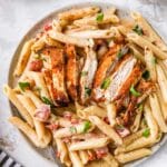 Creamy chicken pasta served on a plate.