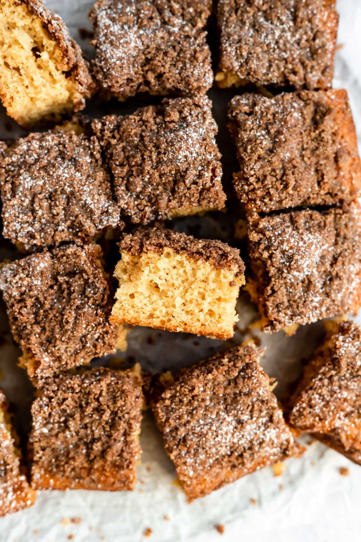 Pieces of coffee cake cut into squares.