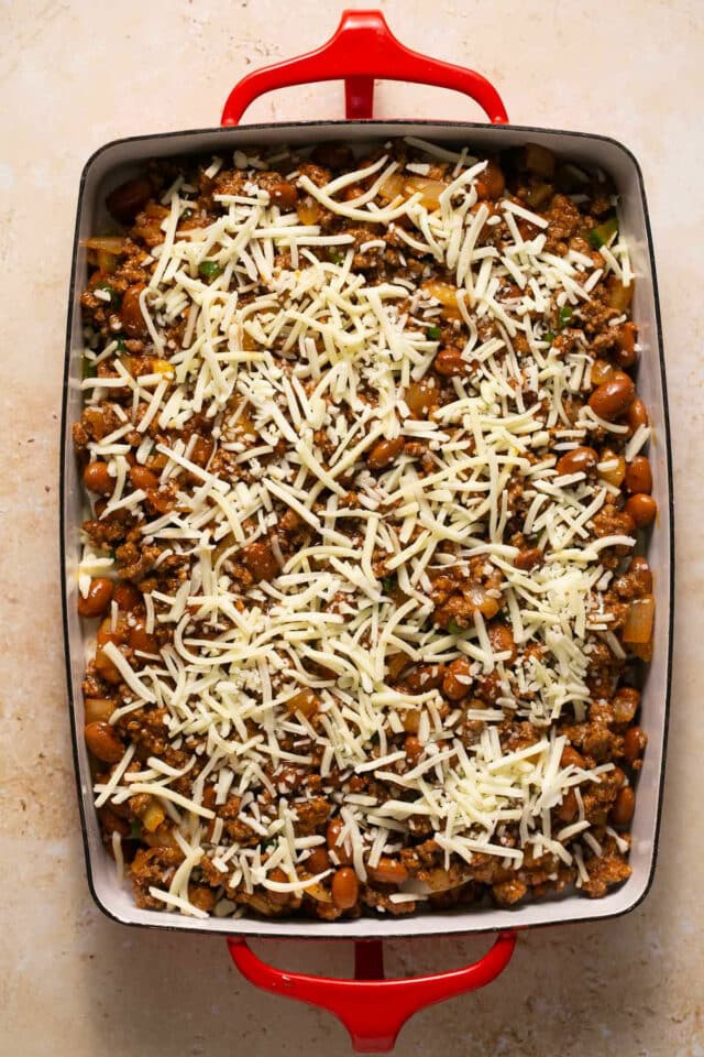 Sprinkle cheese over beef and bean mixture.