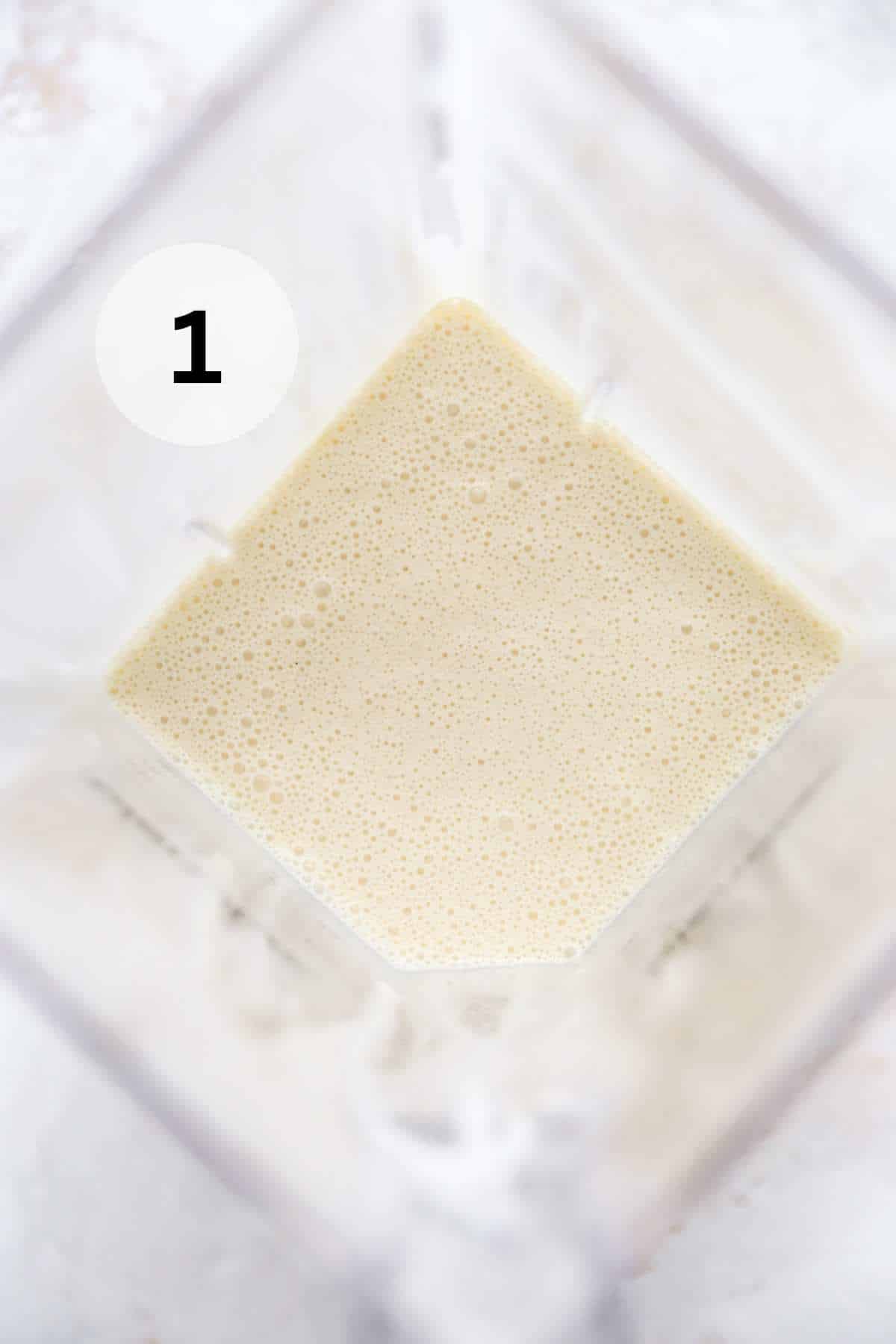 Blended crepe batter in a blender.