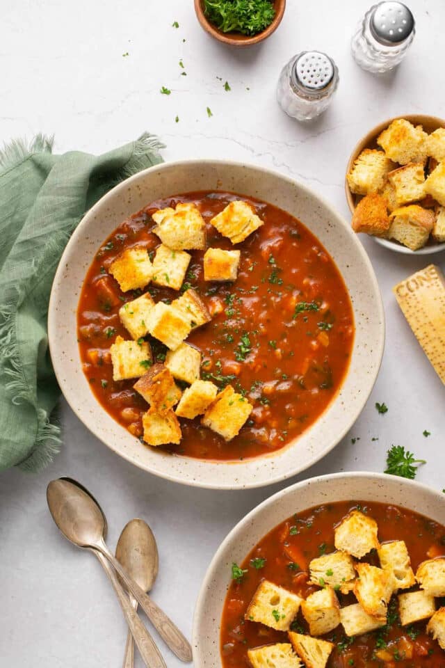 Vegetable soup topped with croutons.