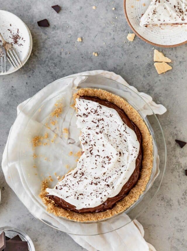 Chocolate pie with several serving taken out.