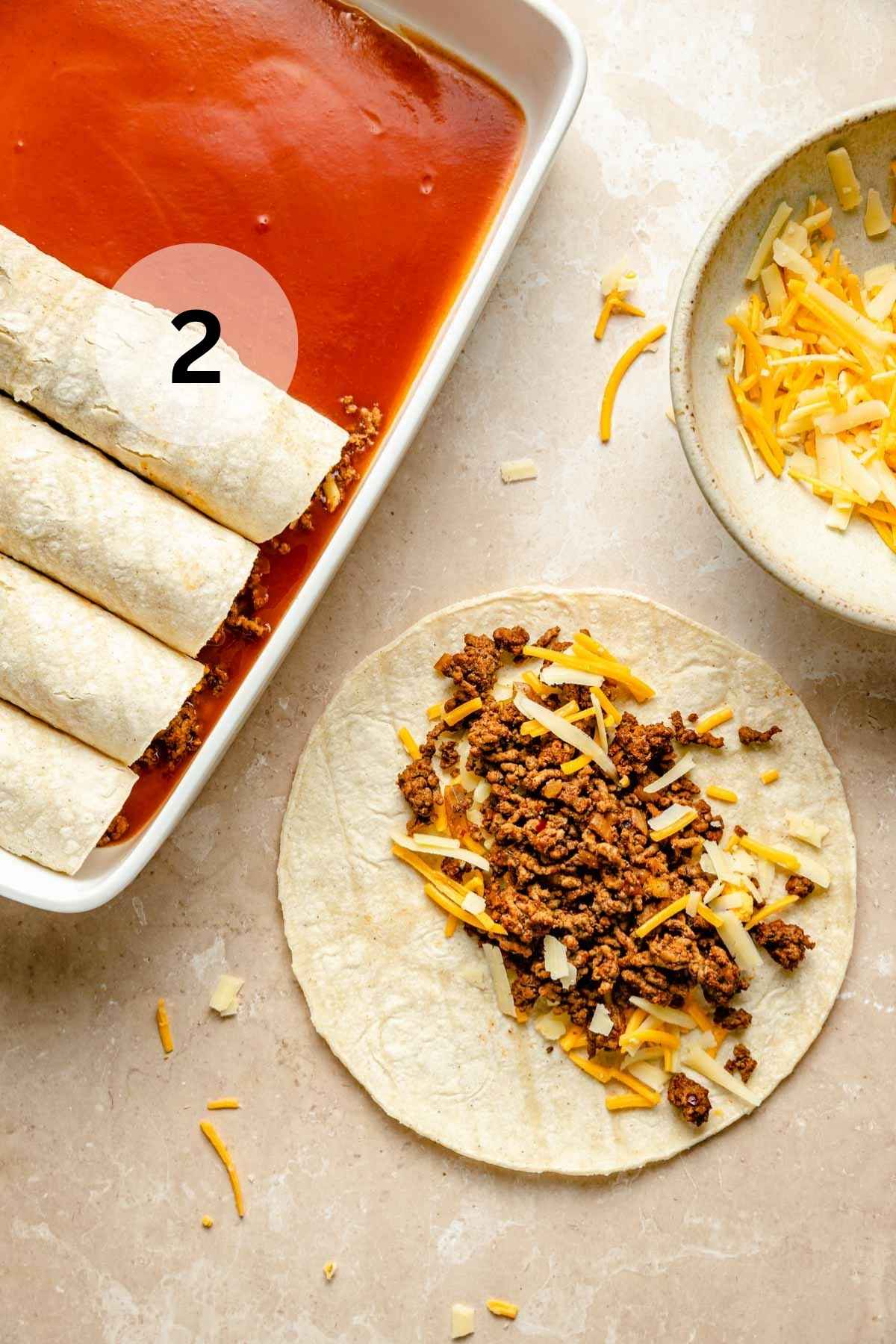 Adding ground beef and cheese to the center of tortillas and rolling them.