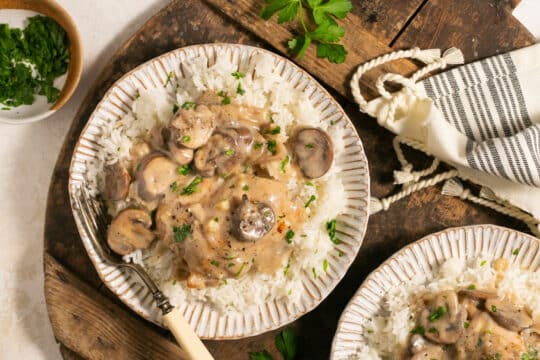 Chicken topped with a mushroom gravy served over white rice.