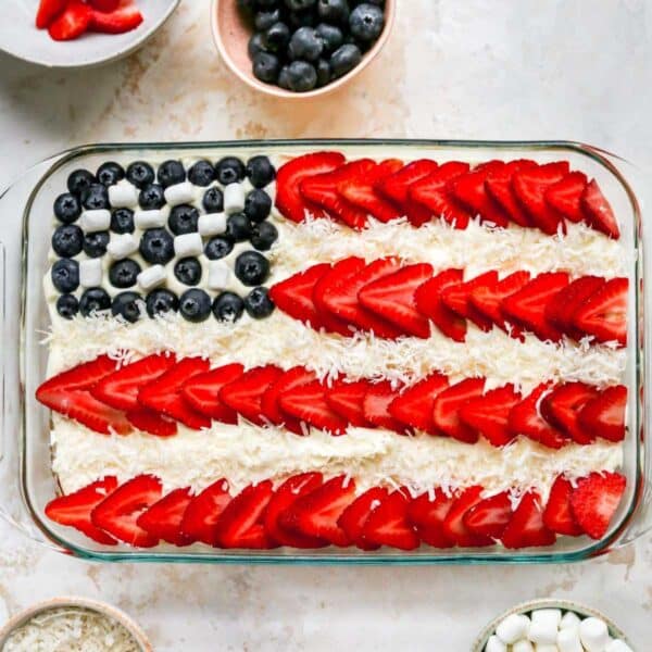 American flag cake decorated with berries.