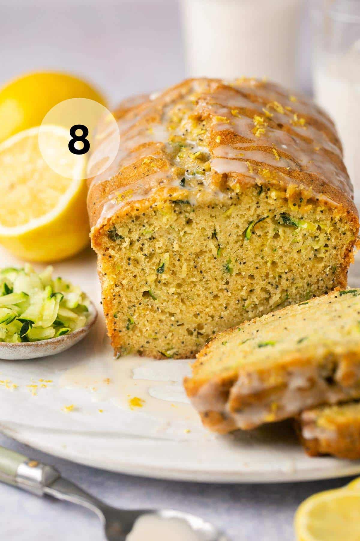 Lemon zucchini bread topped with a glaze.