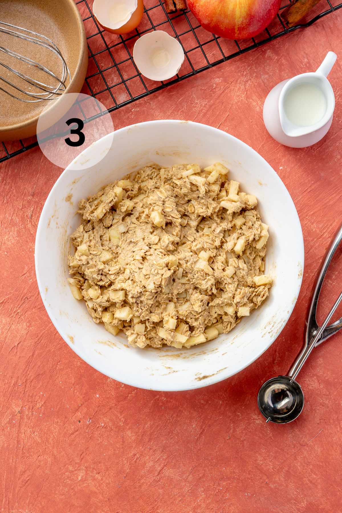 Mixing the batter for apple cookies.