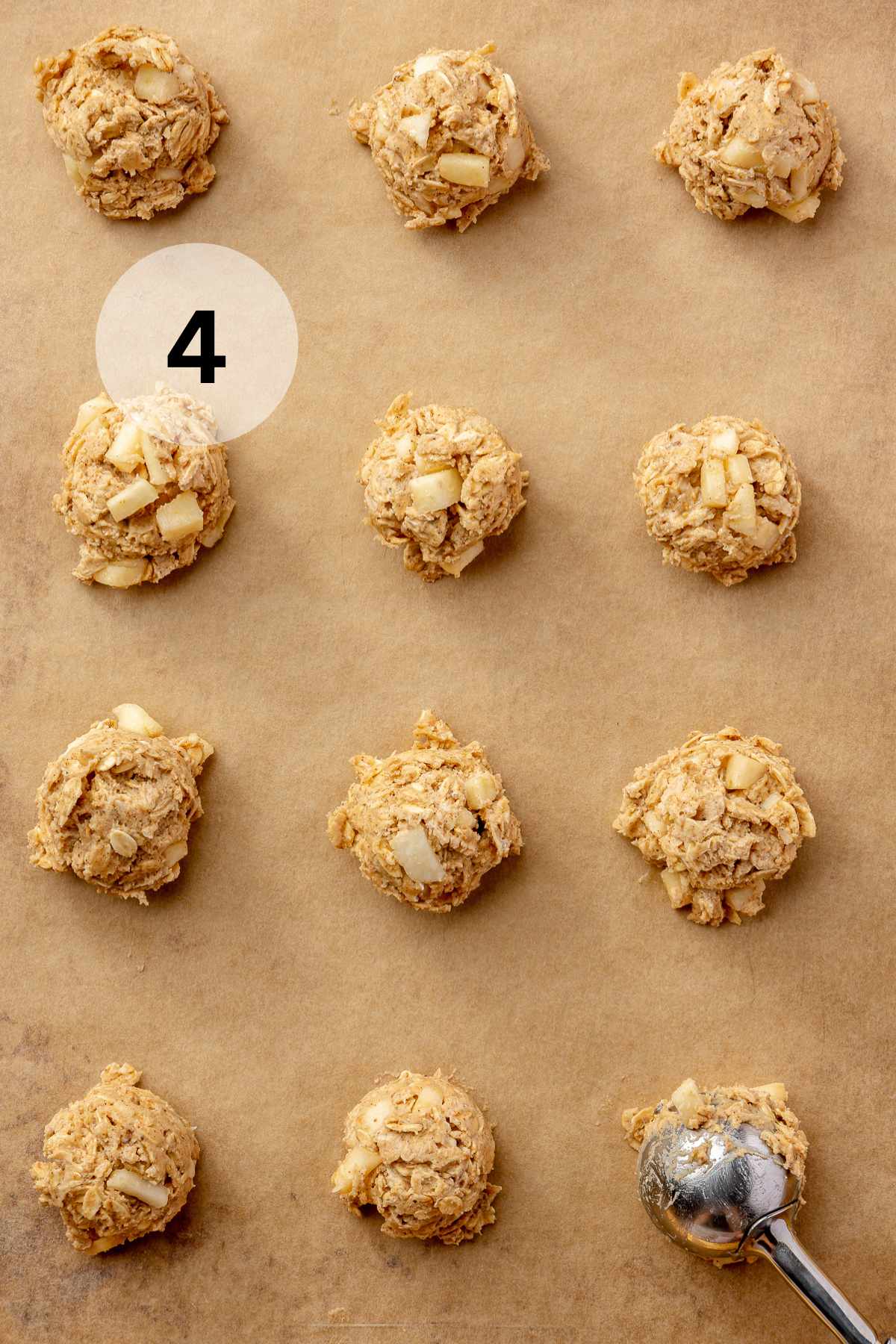 Dough balls on parchment paper.