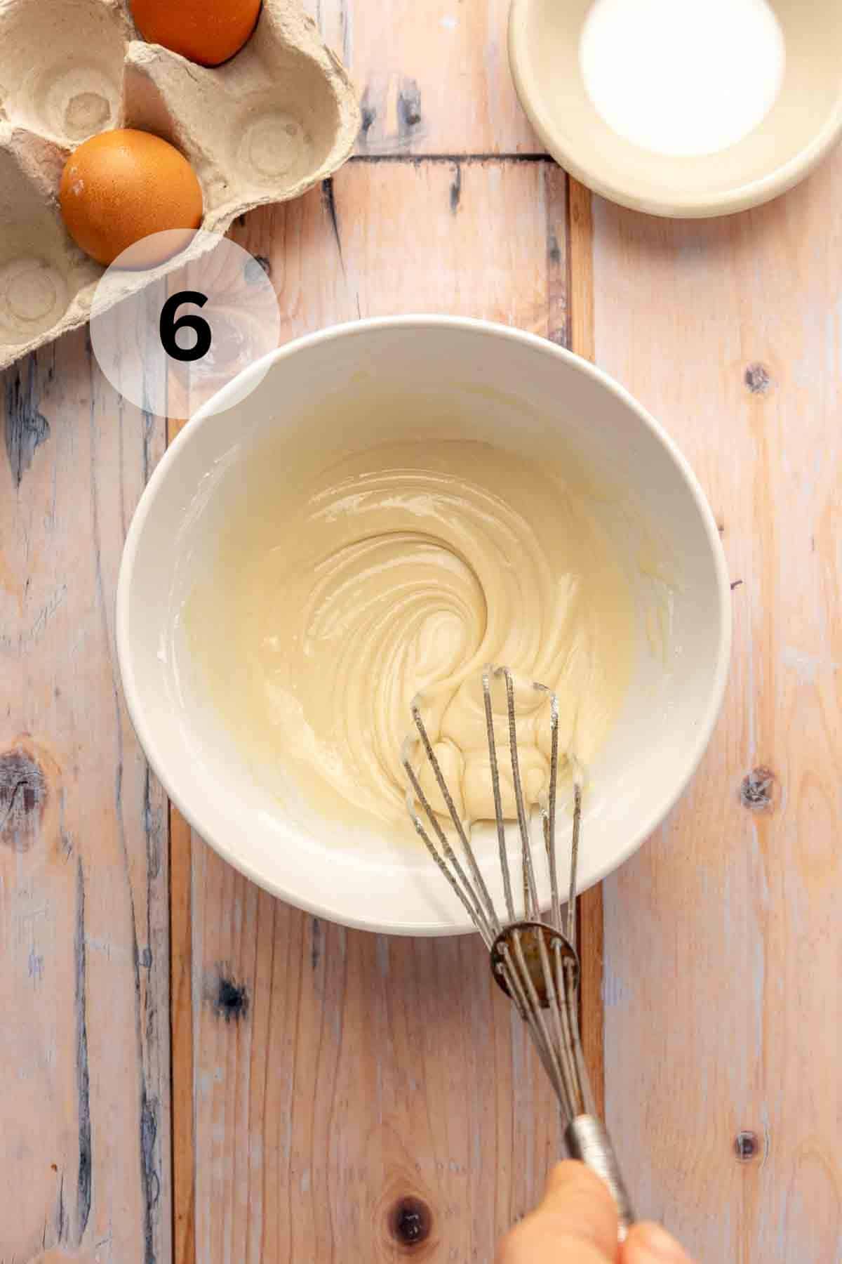 Whisking together the glaze.