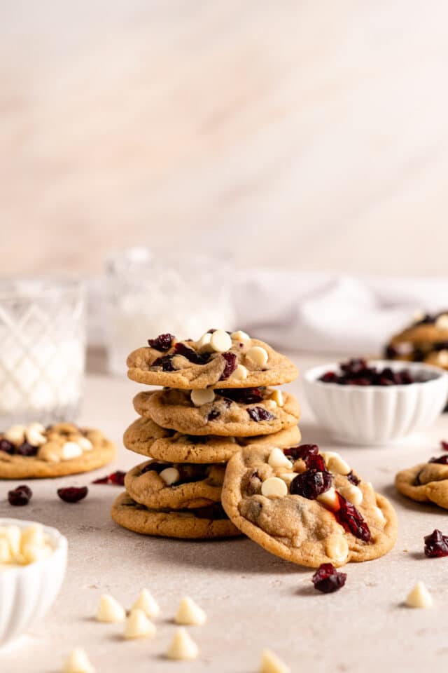 White chocolate cranberry cookies stacked.