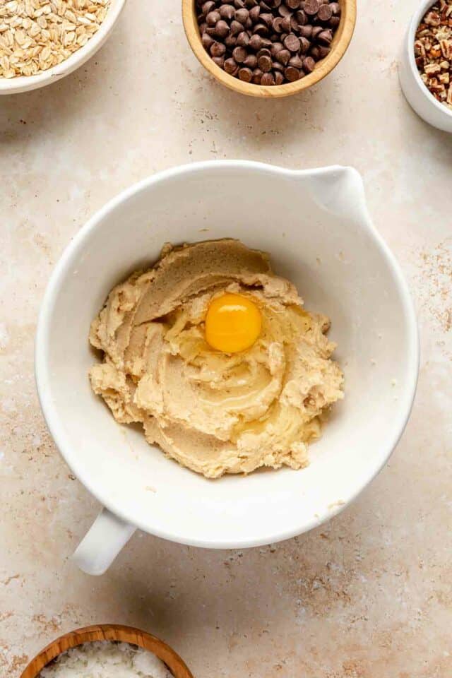 Add egg to butter and sugar mixture.