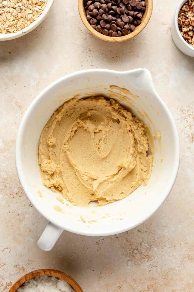 Cookie dough batter in a mixing bowl.