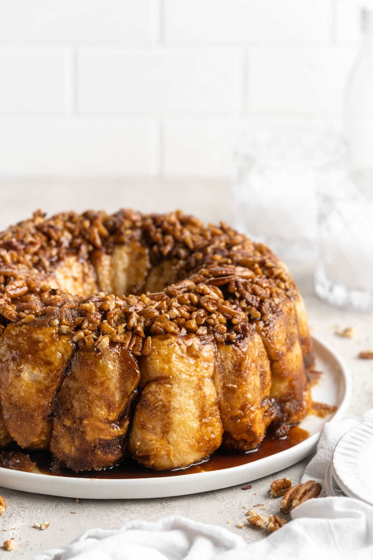 Monkey bread served on a large white plate.