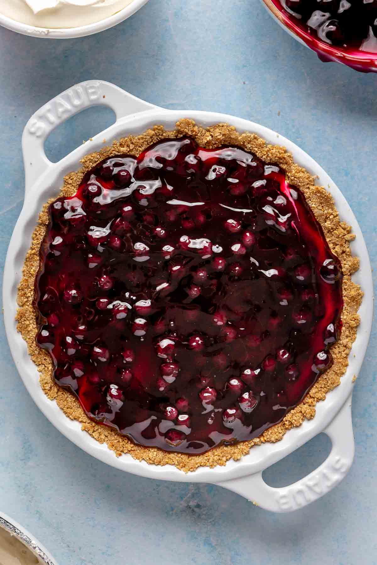 Blueberry pie filling spread over cream cheese mixture.