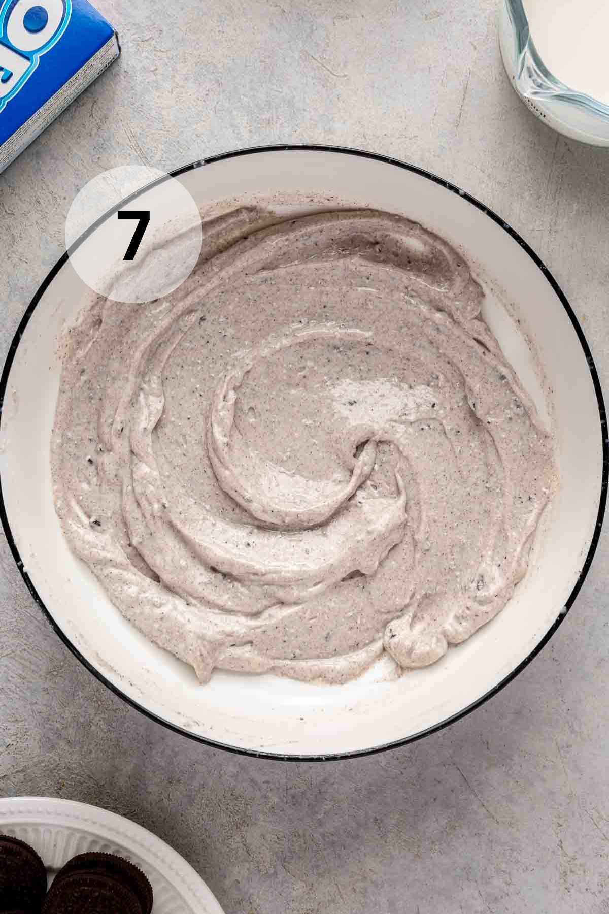 Oreo pudding mixed in a white bowl.