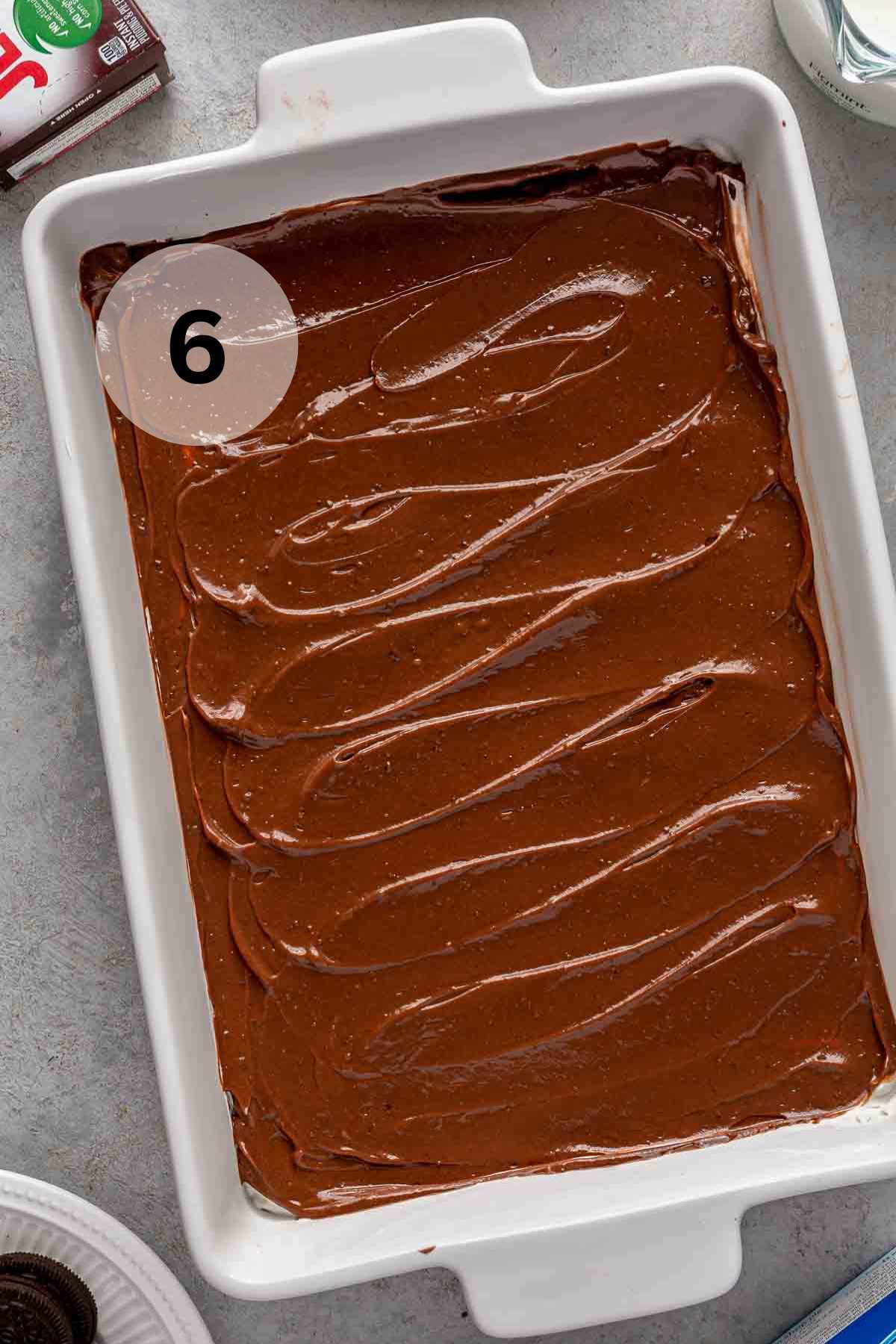 Chocolate pudding spread in a white pan.