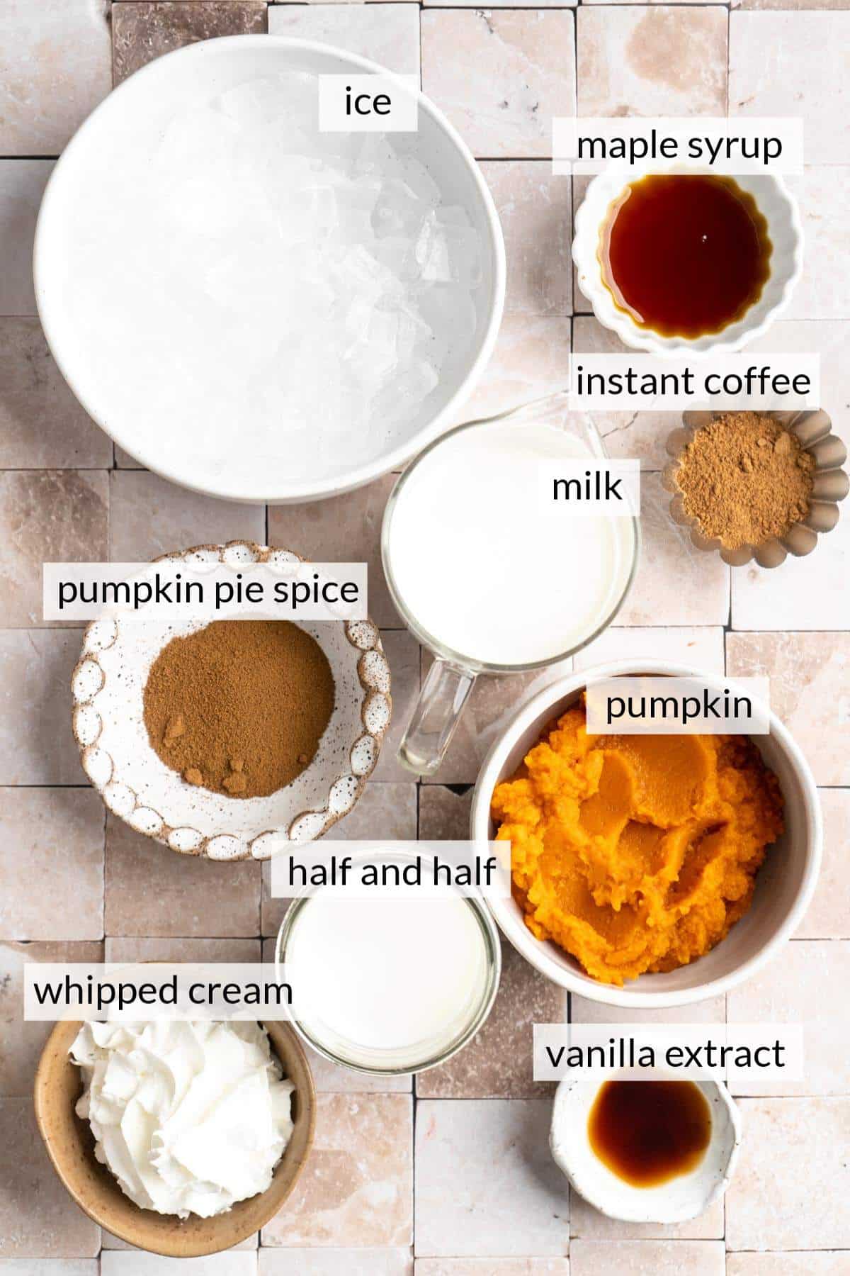 Small bowls with ice, pumpkin, instant coffee, vanilla and milk.