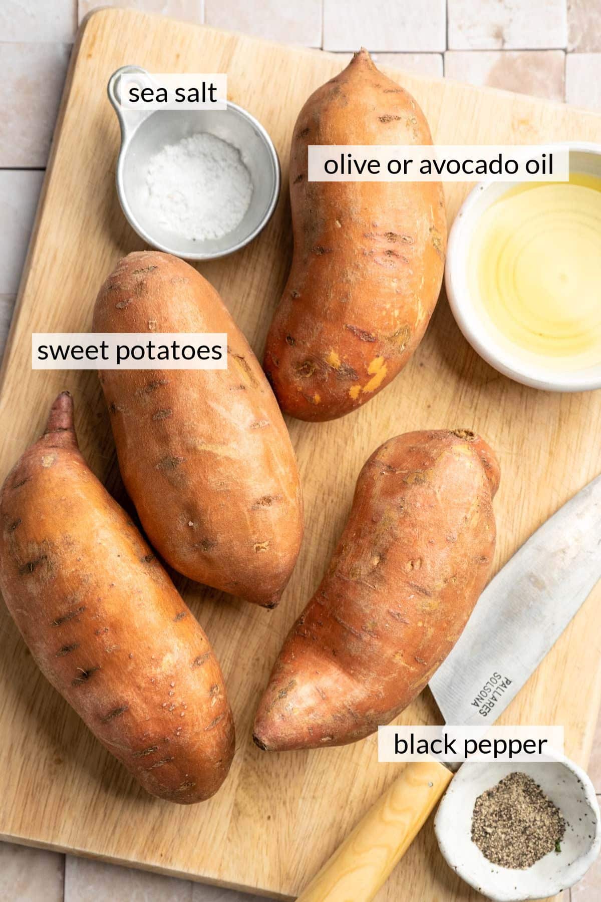 Uncooked sweet potatoes near sea salt, olive oil, and black pepper.