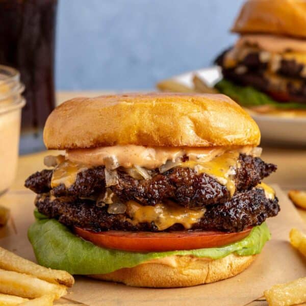 Smash burgers served with fries.