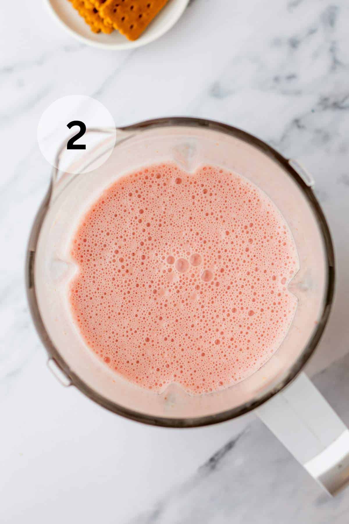 Strawberry shake in a blender.