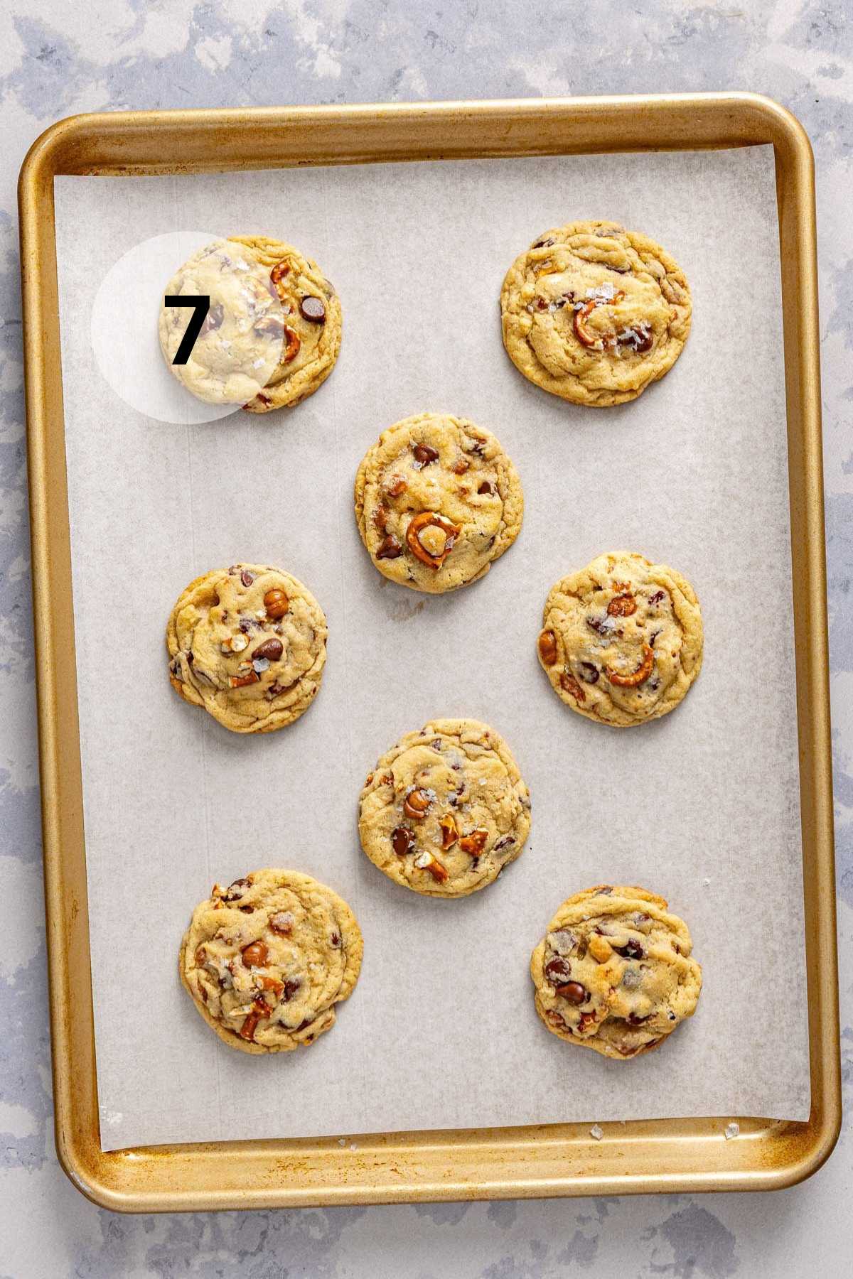 Baked kitchen sink cookies on a pan.