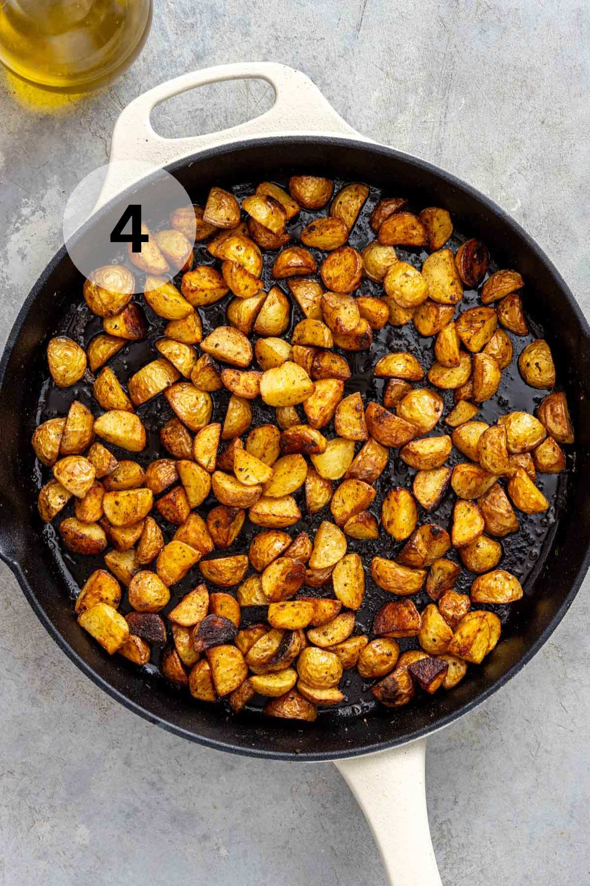 Pan fried potatoes in an iron skillet.