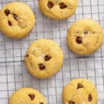 Chocolate chip cookies on a wire rack.