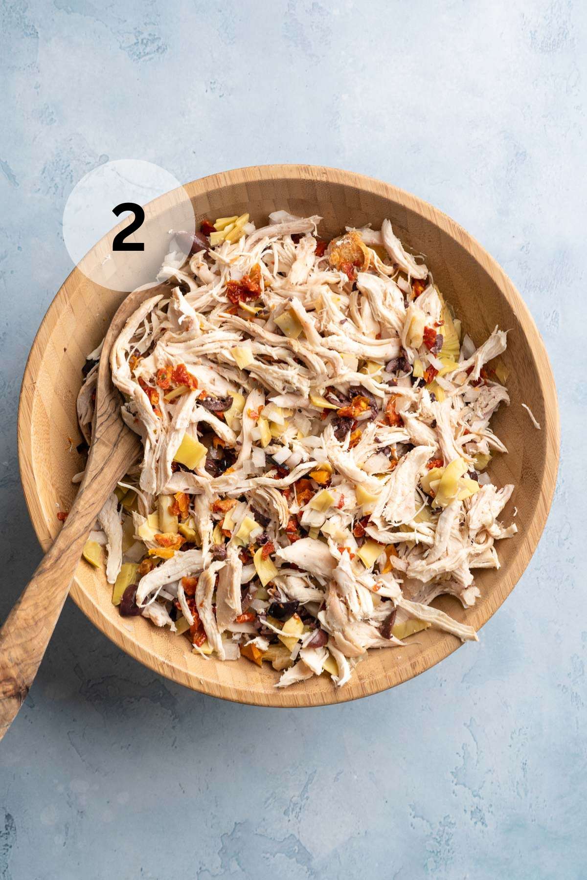 Shredded chicken combined with artichokes, sun-dried tomatoes and olives.