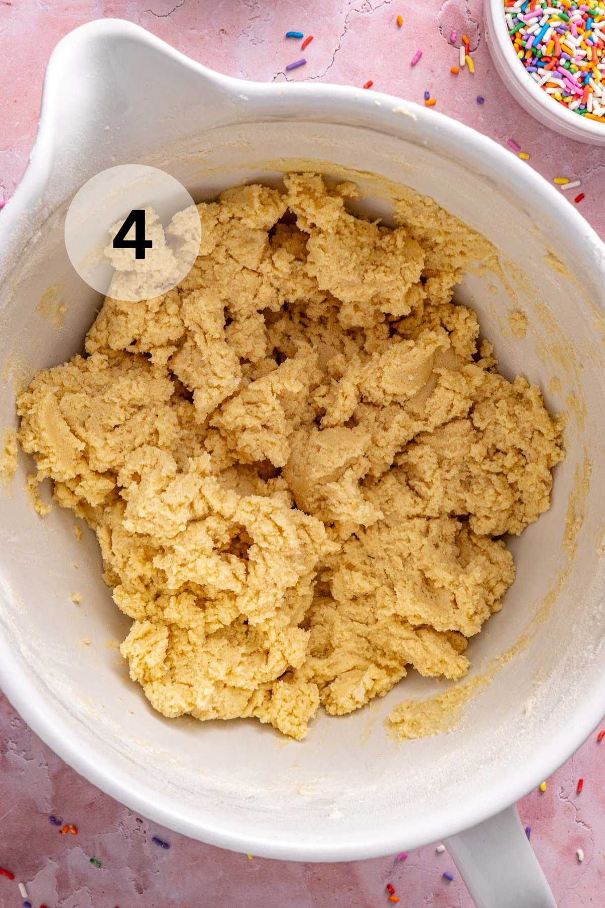 Sugar cookie dough in a large bowl.
