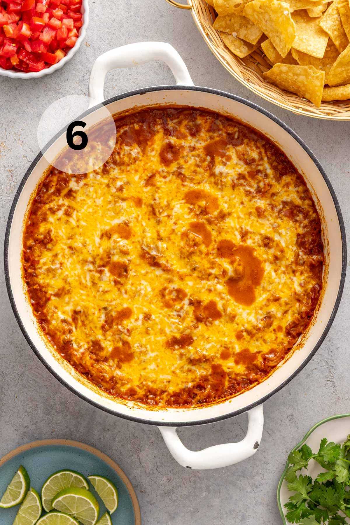 Mexican chicken and rice served with diced tomatoes, tortilla chips and lemon slices.