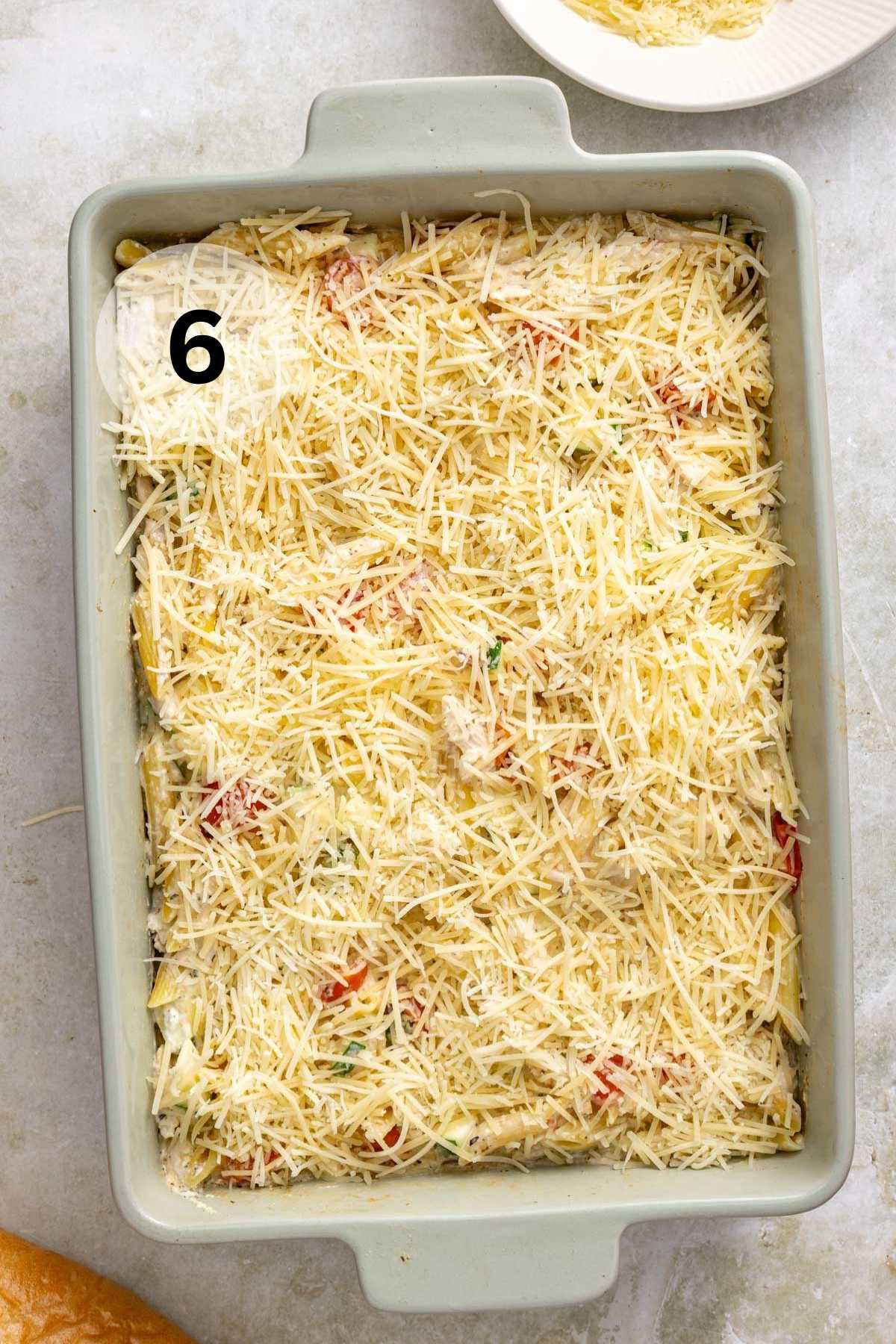 Cheese sprinkled over a casserole dish.
