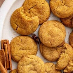 Pumpkin snickerdoodles on a white serving tray.